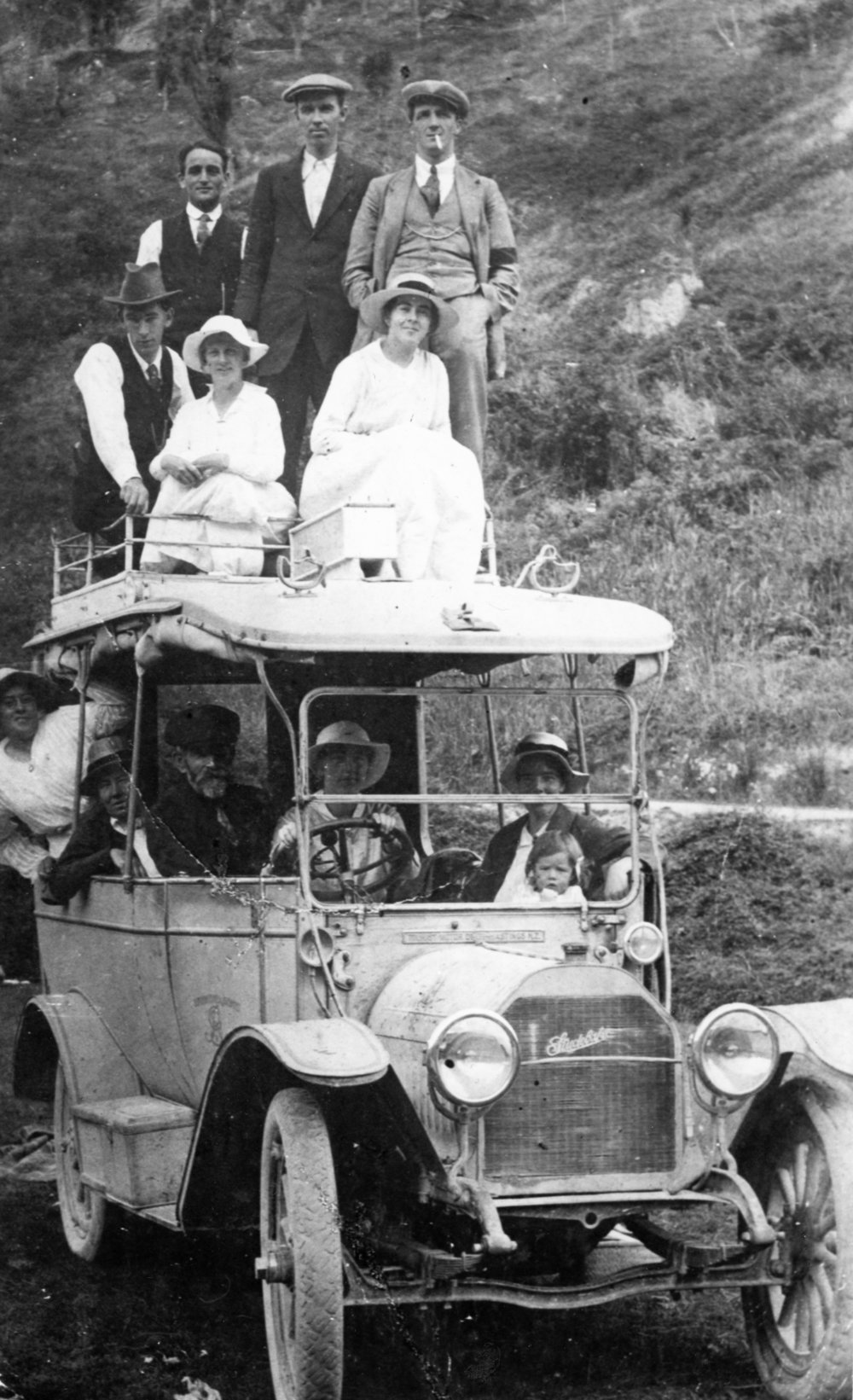 Group Portrait with Studebaker Bus