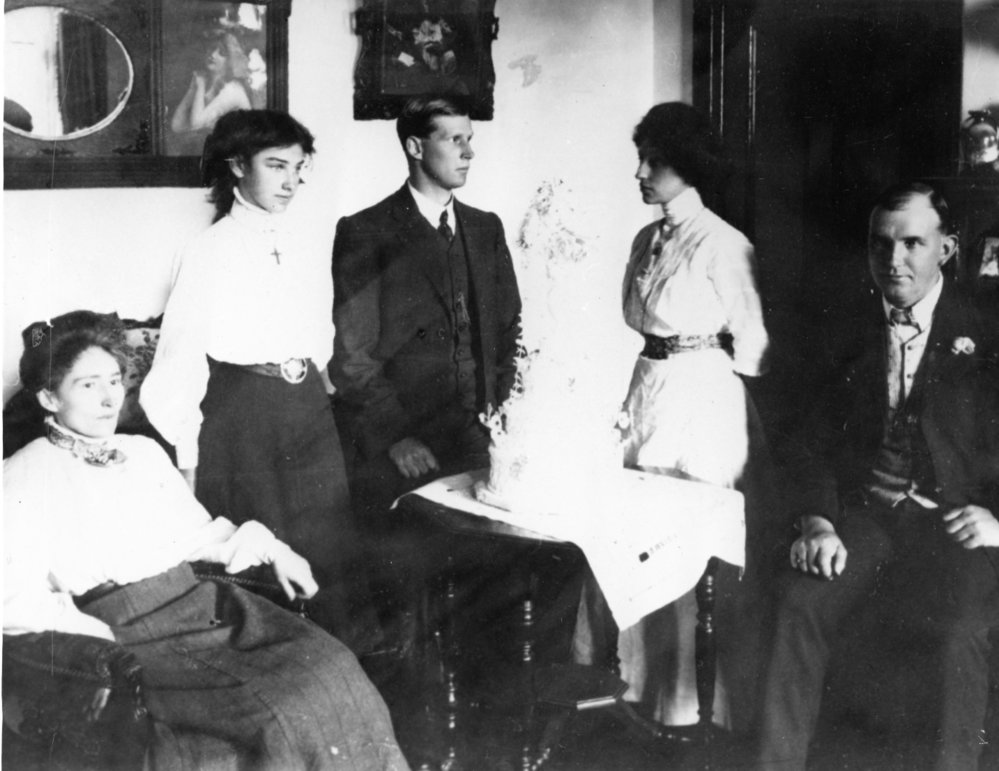 Group Portrait with Wedding Cake