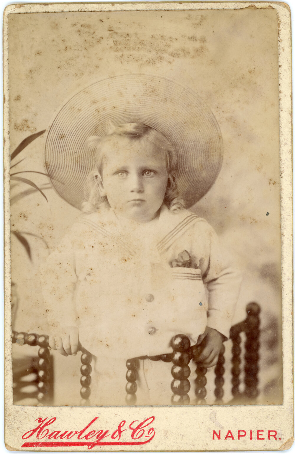 Studio Portrait of Young Child in Sailor Suit