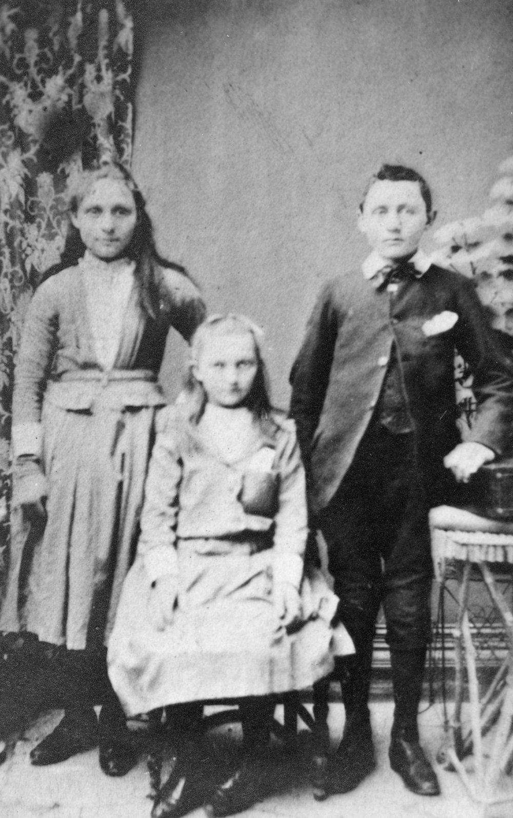 Studio Portrait of Two Girls and a Boy