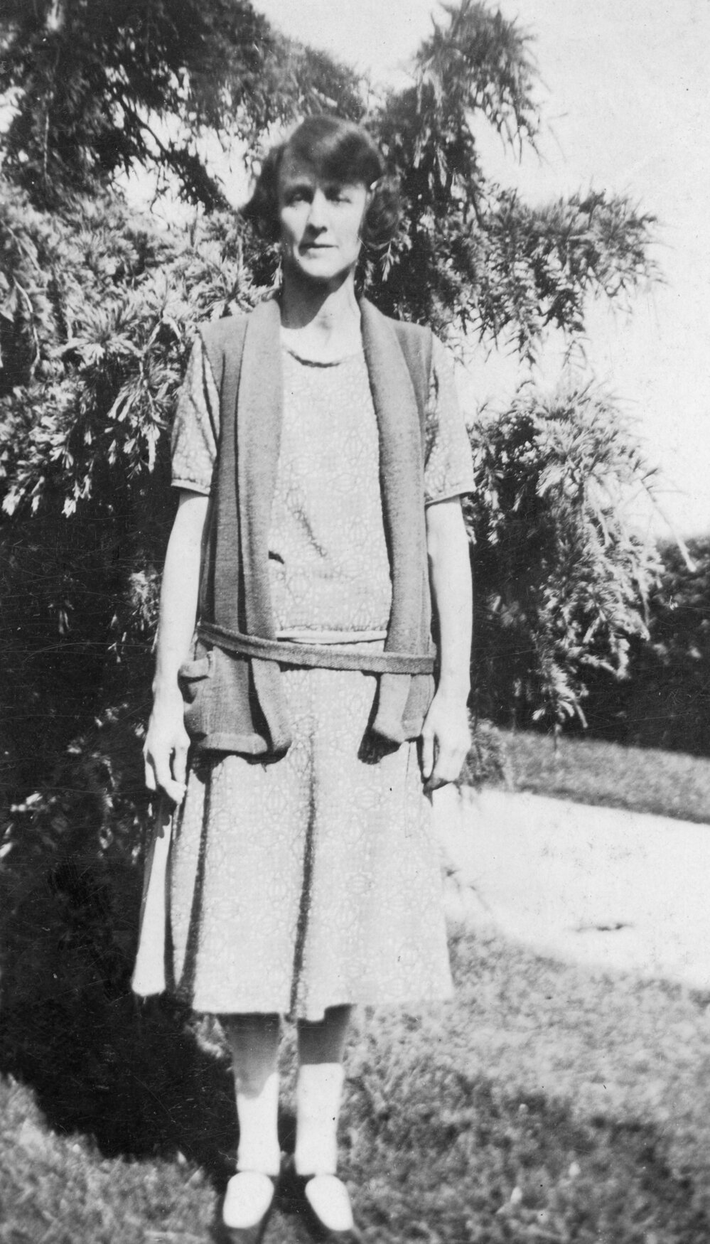 Woman Standing in Garden