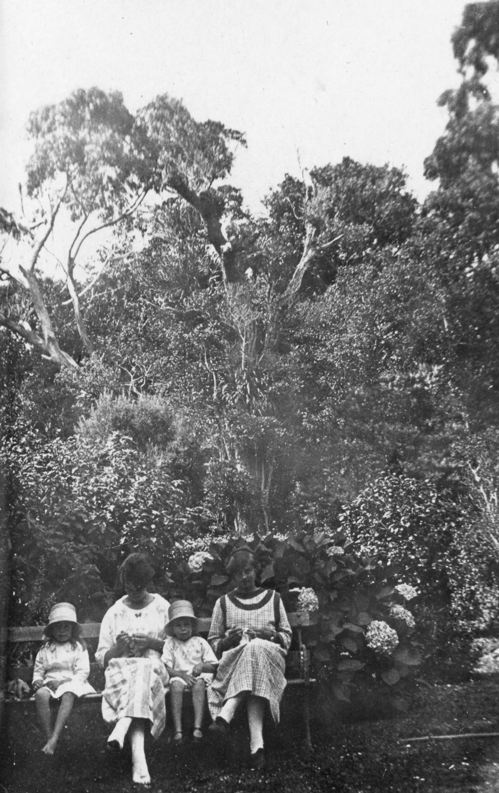 Women and Girls on a Park Bench