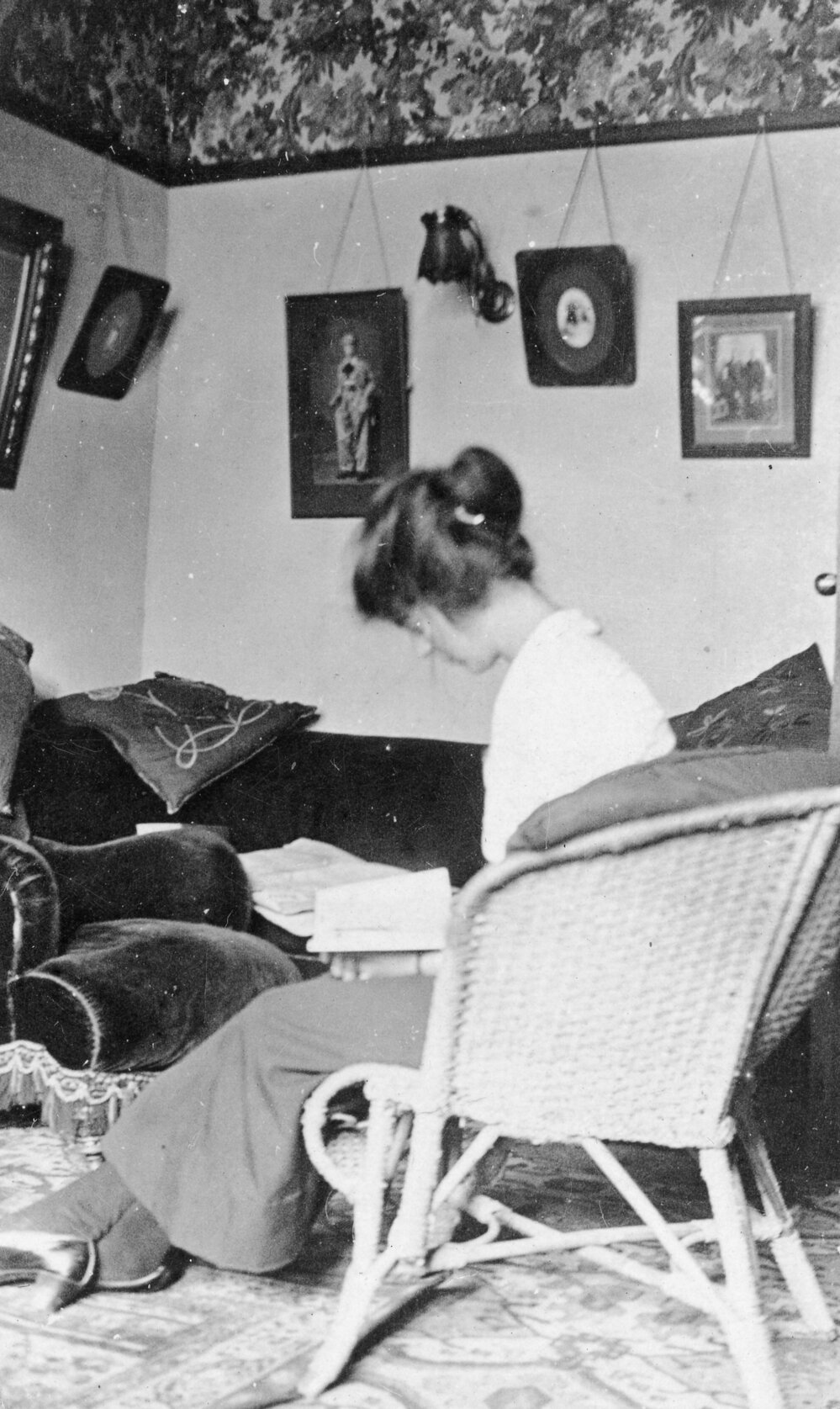 Woman Reading in Living Room