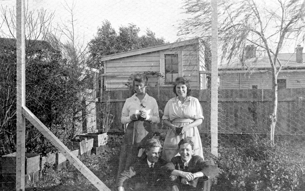 Portrait of Two Women and Two Men in Garden