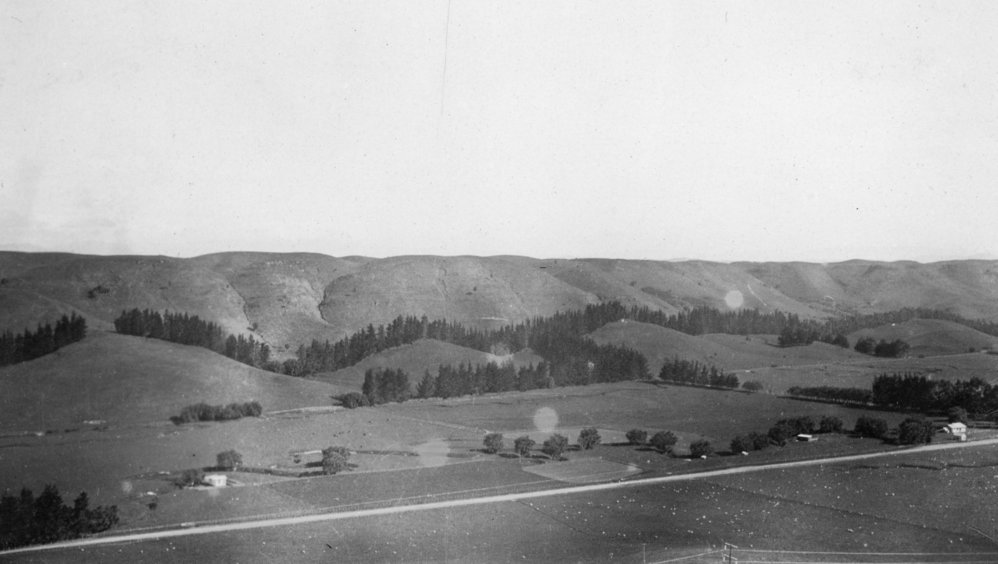 Landscape Scenery with Hills, Houses and Road