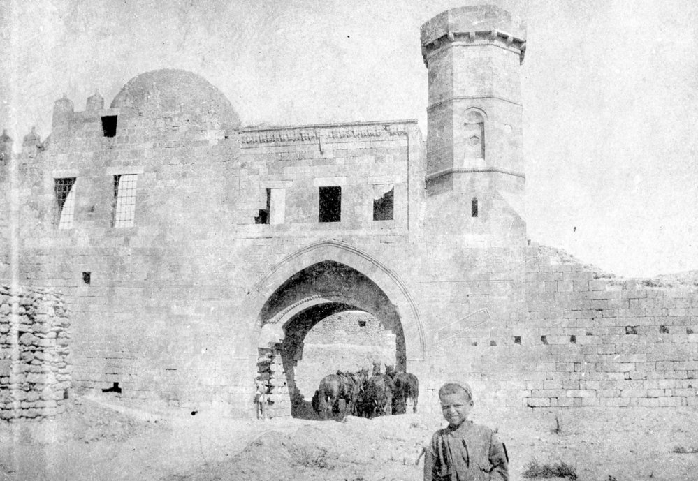 Boy Standing in Front of Mosque, Palestine