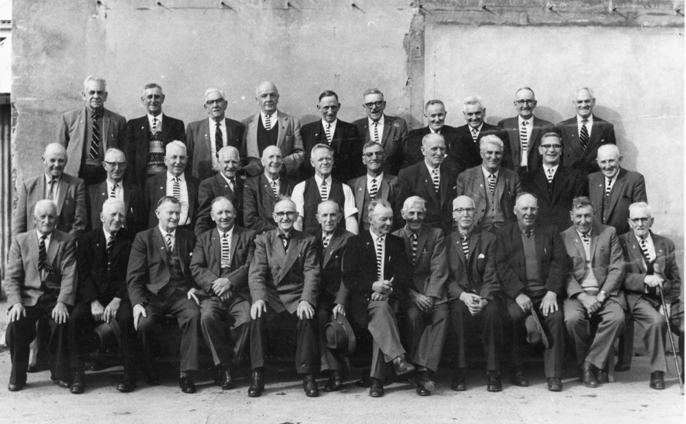 Group Portrait of Men in Striped Ties