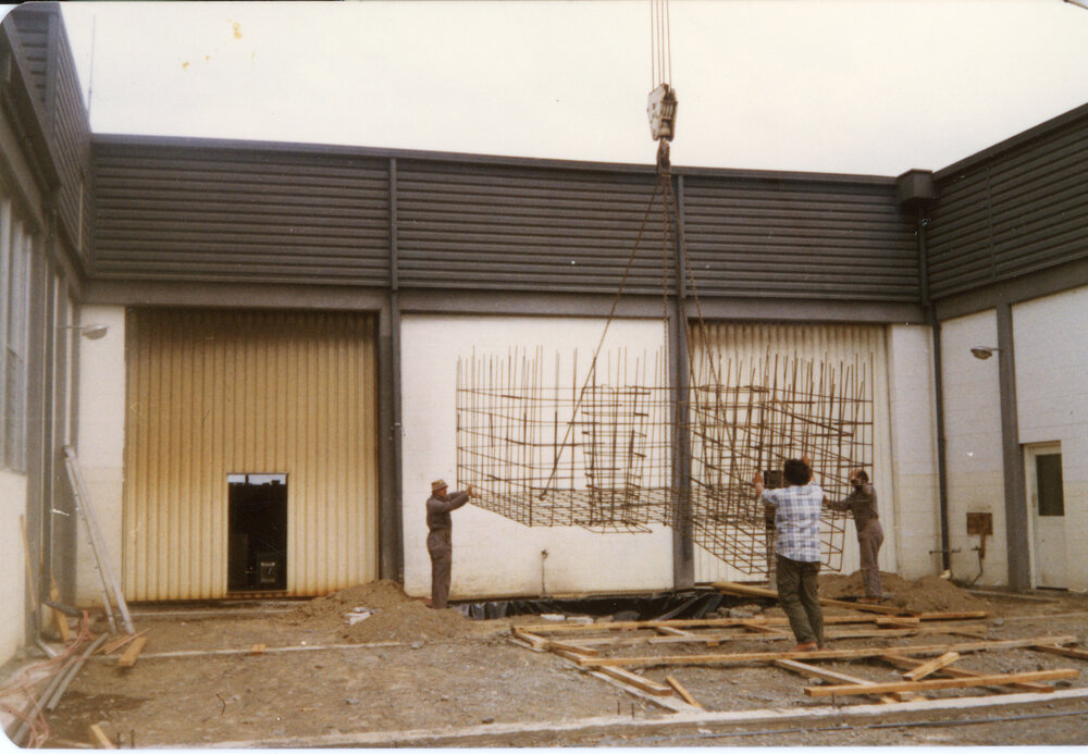 Workers installing steel