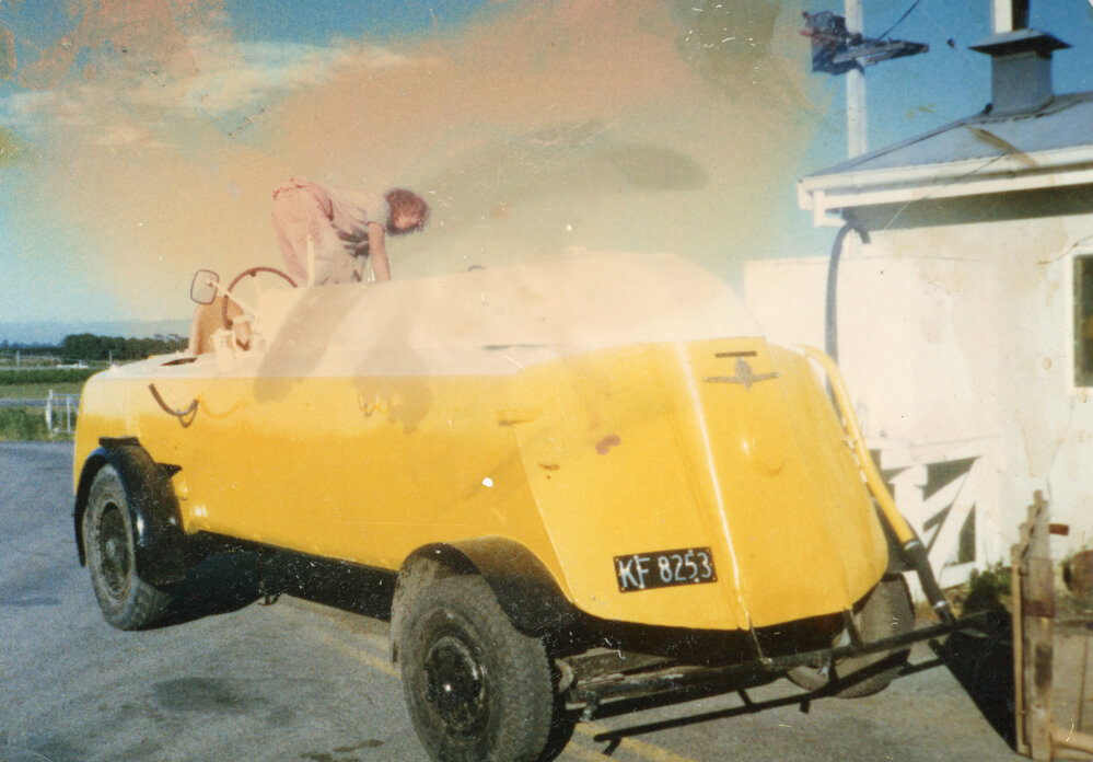 Person Standing on Water Tanker
