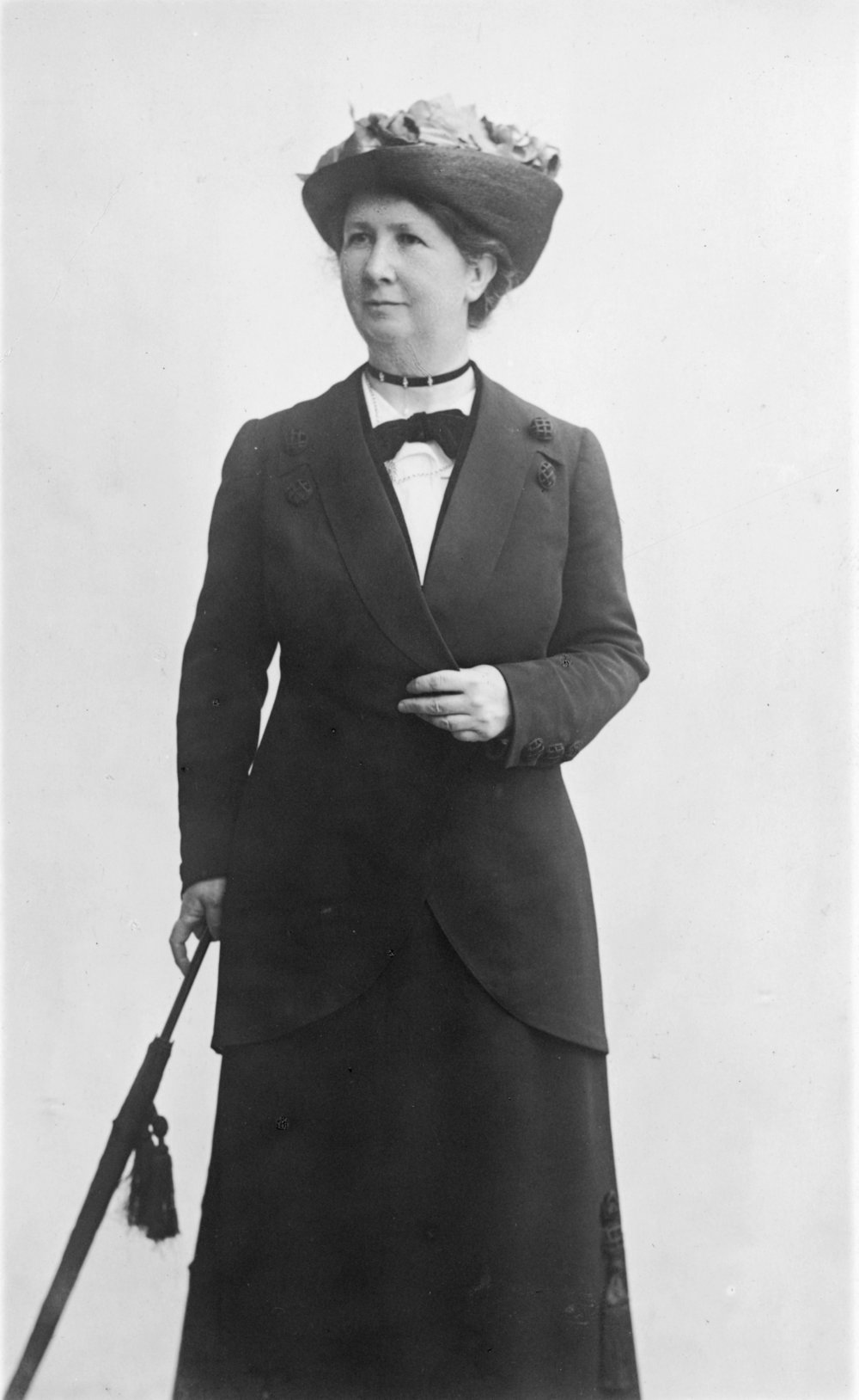 Unidentified Woman Holding an Umbrella