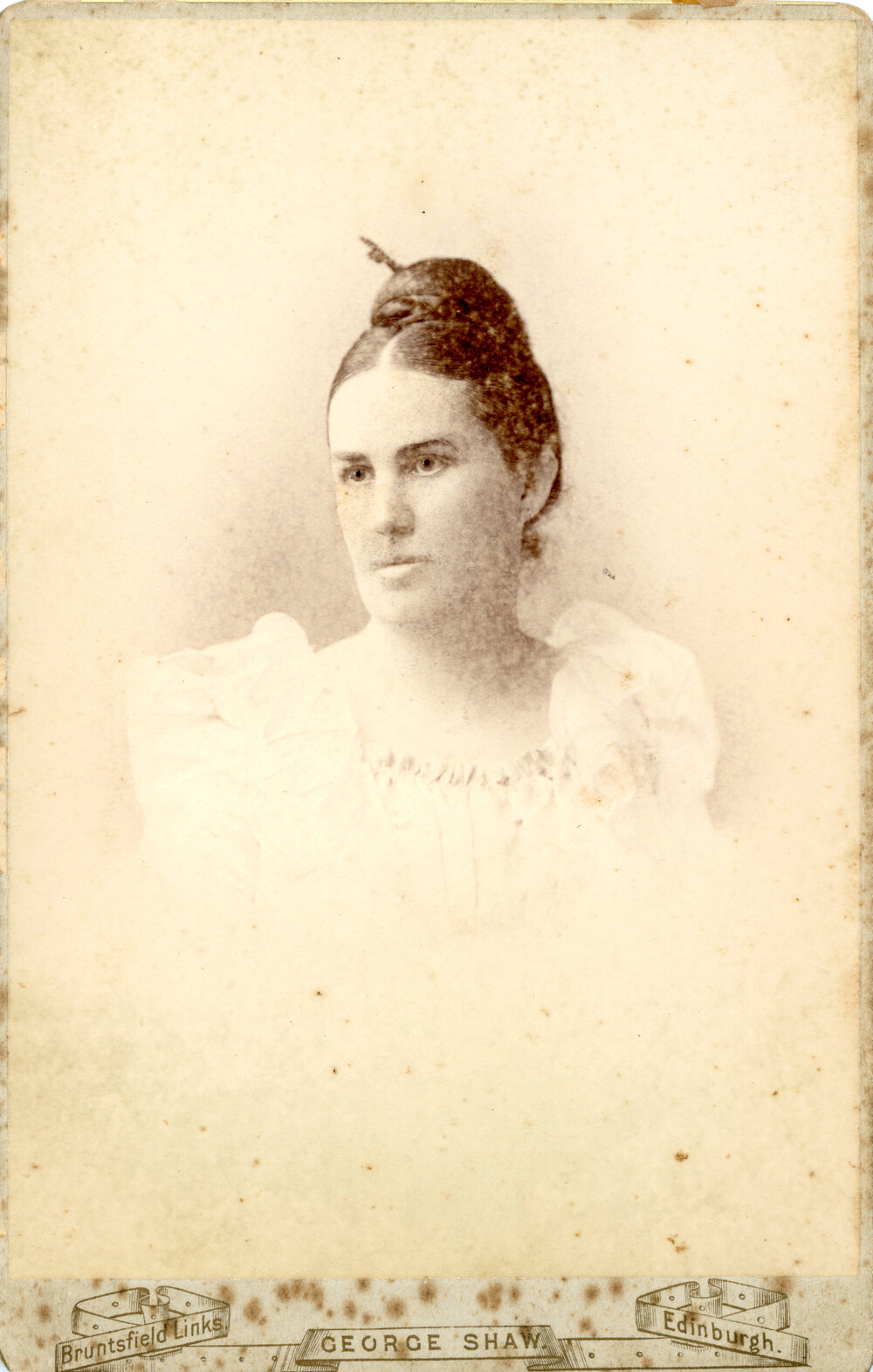 Studio Portrait of Young Woman