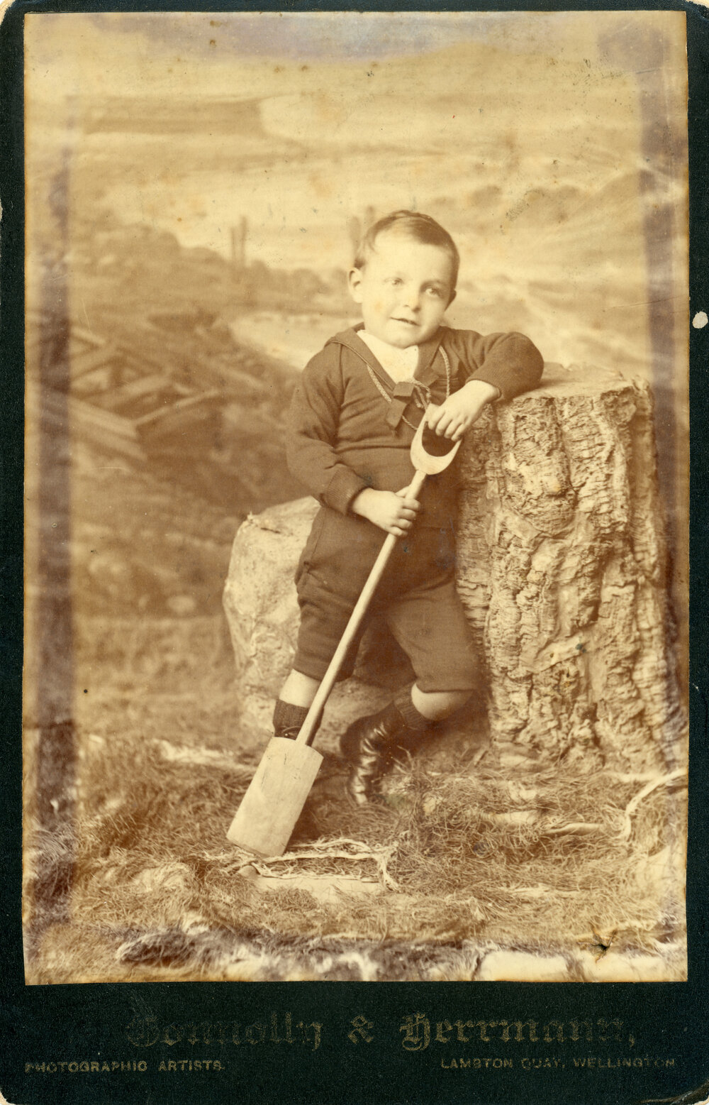 Studio Portrait of Boy in Sailor Suit