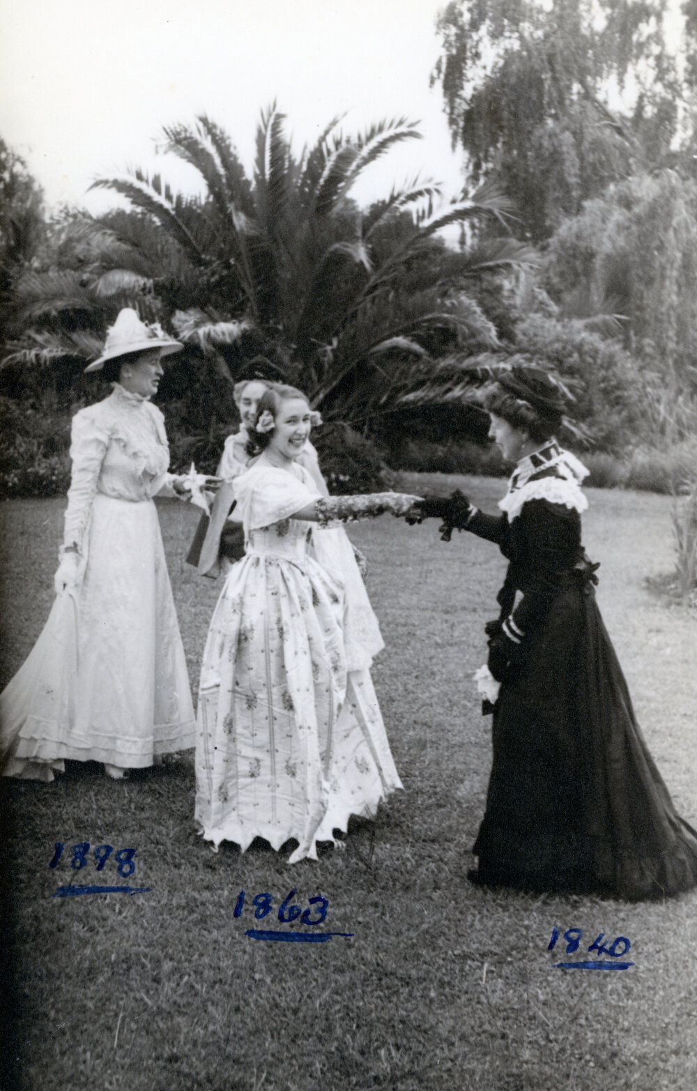 Four Women in Vintage Gowns