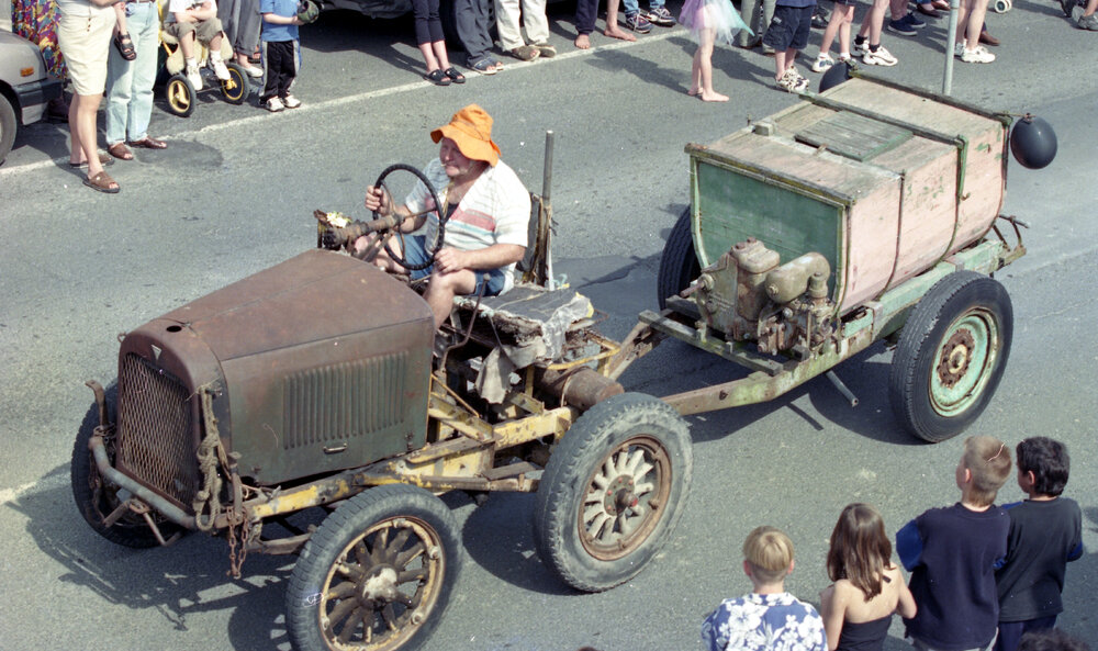 Farmer Driving Old Tractor 1999