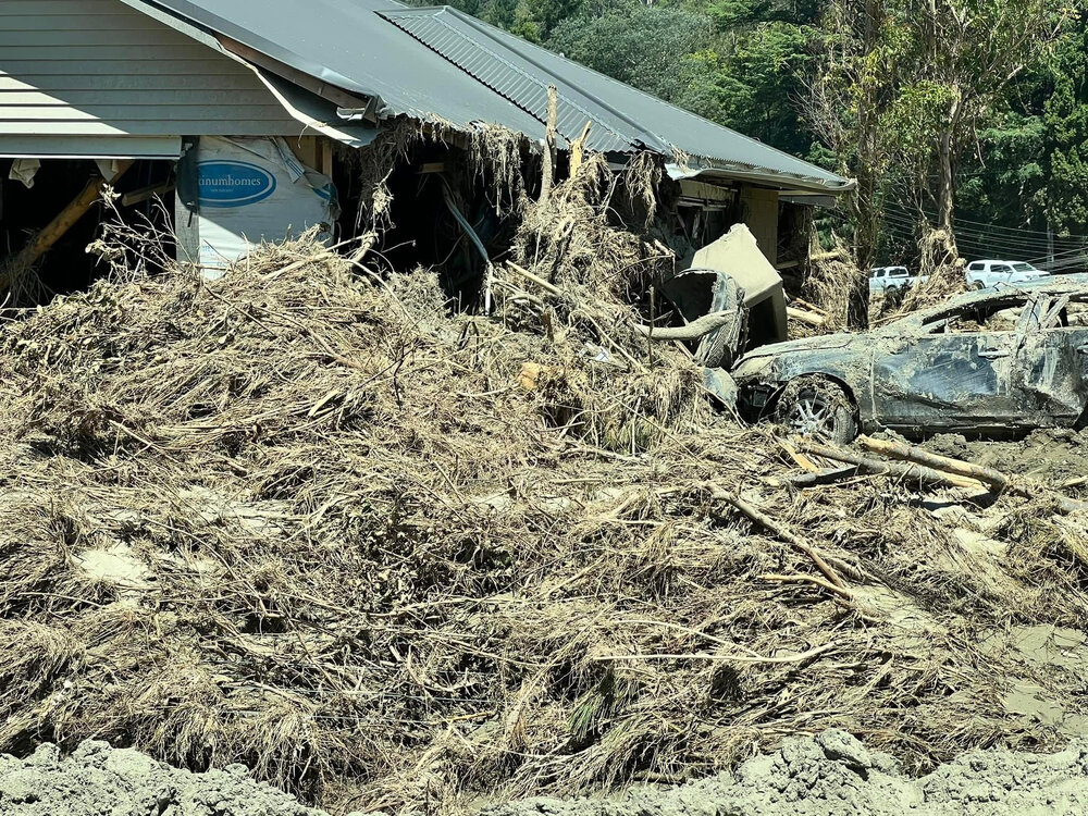 Damaged House and Car