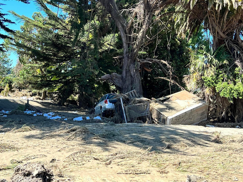 Damaged Car and Debris