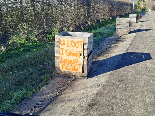 You Loot, I Shoot Sign