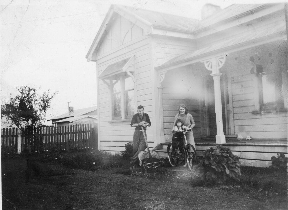 Miles Family Outside Home