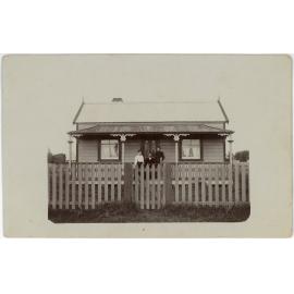 Cottage with Picket Fence