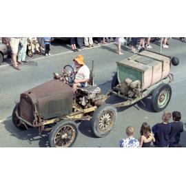Farmer Driving Old Tractor 1999