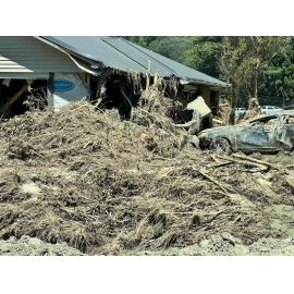 Damaged House and Car