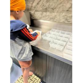 Hudson Helps Prepare Meals