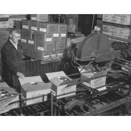 Sealing Boxes of Black Boy Peaches