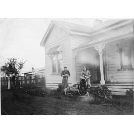 Miles Family Outside Home