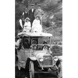 Group Portrait with Studebaker Bus