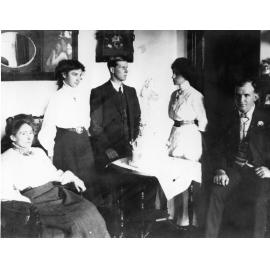 Group Portrait with Wedding Cake
