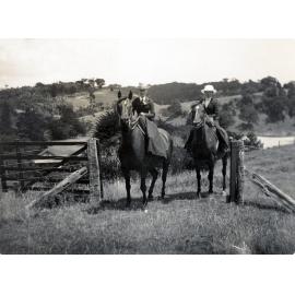 Two Unidentified Women on Horseback