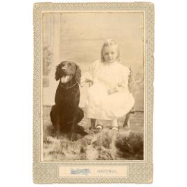 Studio Portrait of a Young Girl and Dog