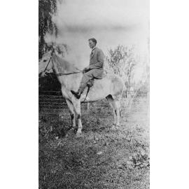 Roy Wellwood Riding a Horse