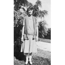 Woman Standing in Garden