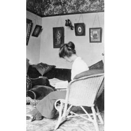 Woman Reading in Living Room