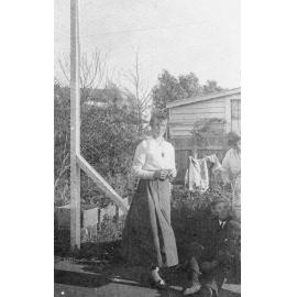 Two Women and a Man in Garden