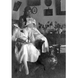 Portrait of Two Girls in a Living Room