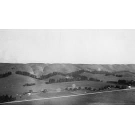 Landscape Scenery with Hills, Houses and Road