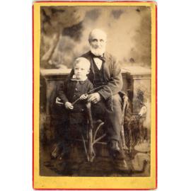 Studio Portrait of Young Boy with Elderly Man