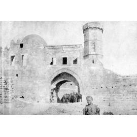 Boy Standing in Front of Mosque, Palestine