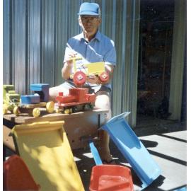 Bill Francis Repairing Toys