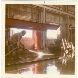 Man with Industrial Hose