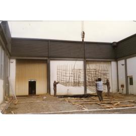 Workers installing steel