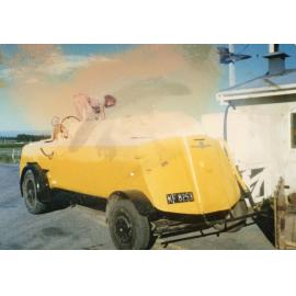 Person Standing on Water Tanker