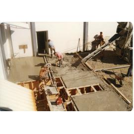 Workers Laying Concrete