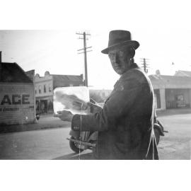 Man with Fish Frozen in Ice